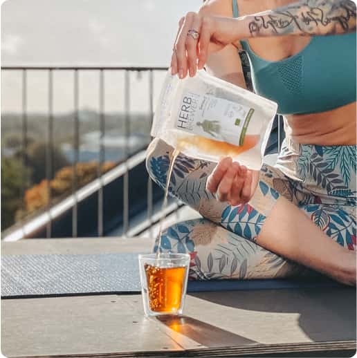 HERB BREWER organic herbal tea being poured after yoga – sustainable tea pouch for healthy wellness routines